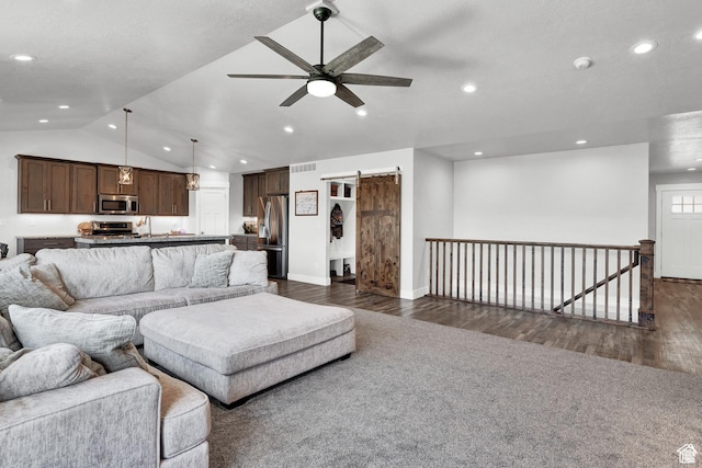 1021 N 600 E, Morgan, UT 84050 - living room featuring lofted ceiling, a ceiling fan, recessed lighting, dark wood-type flooring, and a barn door