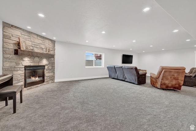 1021 N 600 E, Morgan, UT 84050 - carpeted living room featuring recessed lighting, a stone fireplace, and baseboards