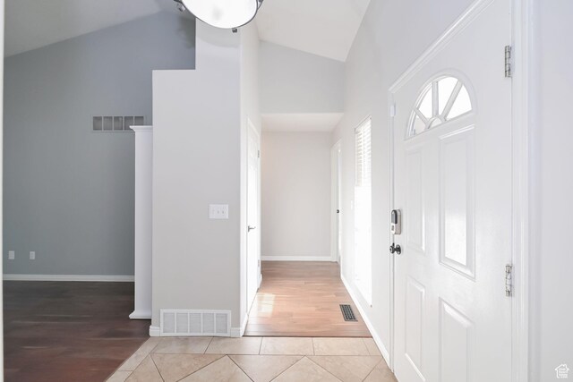 3568 N 500 E, North Ogden, UT 84414 - foyer entrance featuring high vaulted ceiling, light wood-style floors, and baseboards