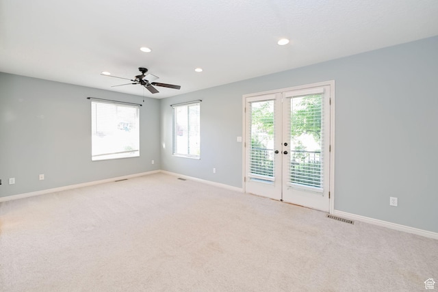 3568 N 500 E, North Ogden, UT 84414 - empty room featuring light carpet, recessed lighting, french doors, and baseboards