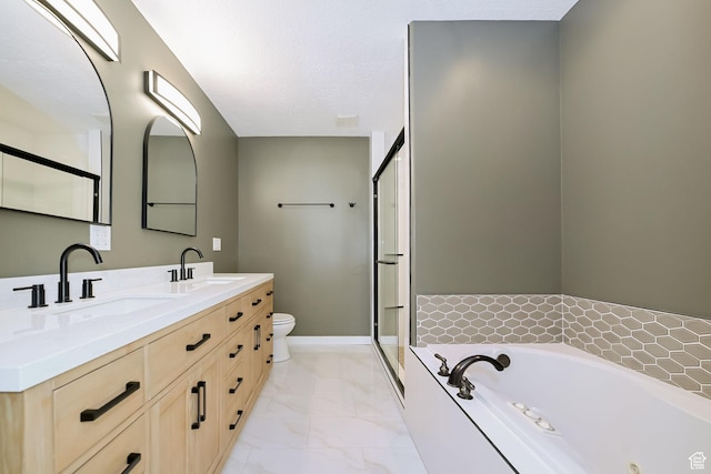 3568 N 500 E, North Ogden, UT 84414 - bathroom featuring marble look tile flooring, a garden tub, a stall shower, double vanity, and toilet