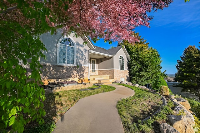 3568 N 500 E, North Ogden, UT 84414 - view of front facade featuring stucco siding and stone siding