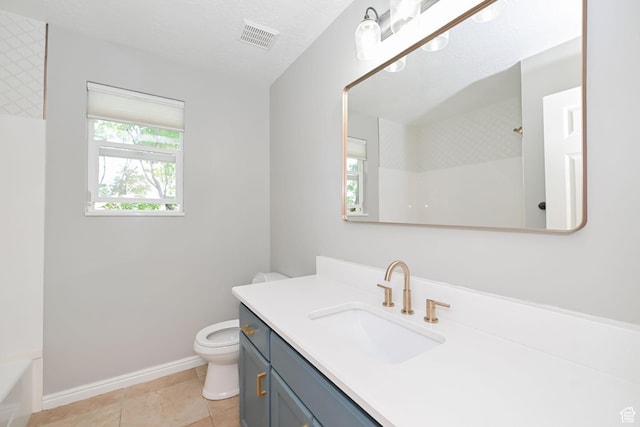 3568 N 500 E, North Ogden, UT 84414 - full bathroom featuring a shower, toilet, baseboards, vanity, and tile patterned floors