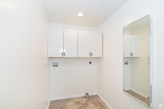 3568 N 500 E, North Ogden, UT 84414 - laundry room featuring hookup for a washing machine, electric dryer hookup, cabinet space, and baseboards