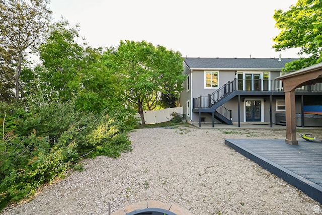 3568 N 500 E, North Ogden, UT 84414 - rear view of property with stairway, a deck, fence, and a patio