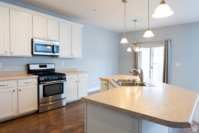 1645 W 430 N, Lindon, UT 84042 - kitchen with sink, a center island with sink, white cabinets, and appliances with stainless steel finishes