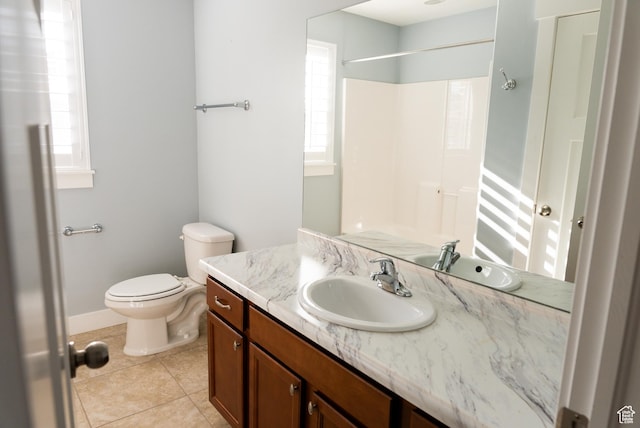 1645 W 430 N, Lindon, UT 84042 - bathroom featuring walk in shower, tile patterned flooring, vanity, and toilet