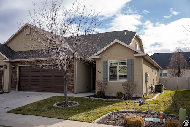 1645 W 430 N, Lindon, UT 84042 - ranch-style home featuring a garage, central air condition unit, and a front yard