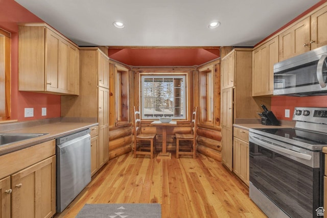 4125 S Buck Way Unit 1958, Heber City, UT 84032 - kitchen featuring rustic walls, sink, light hardwood / wood-style flooring, light brown cabinetry, and appliances with stainless steel finishes