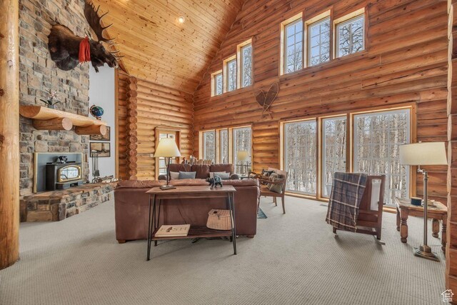 4125 S Buck Way Unit 1958, Heber City, UT 84032 - living room with a wood stove, high vaulted ceiling, carpet flooring, rustic walls, and wood ceiling