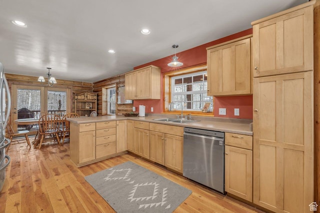 4125 S Buck Way Unit 1958, Heber City, UT 84032 - kitchen with sink, dishwasher, hanging light fixtures, light brown cabinets, and kitchen peninsula