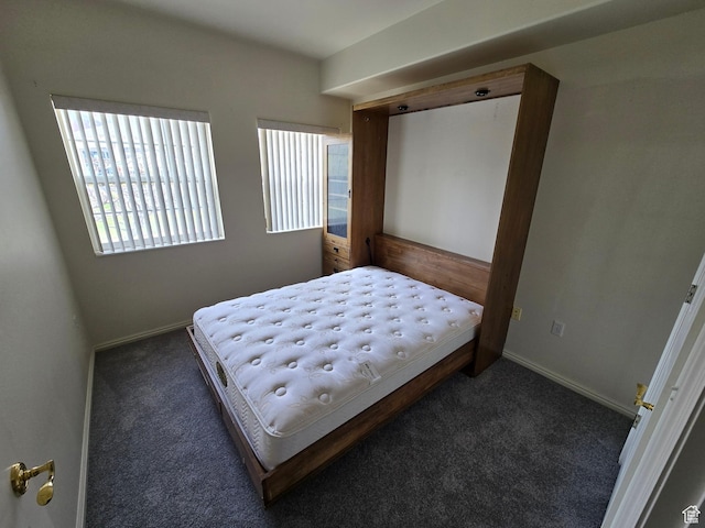 11075 S Grape Arbor Pl E Unit 103, Sandy, UT 84070 - carpeted bedroom featuring baseboards