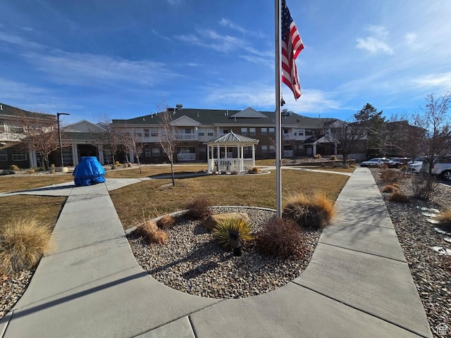 surrounding community featuring a yard