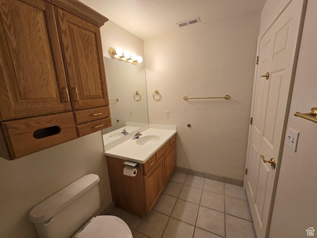 11075 S Grape Arbor Pl E Unit 103, Sandy, UT 84070 - bathroom with tile patterned flooring, toilet, vanity, baseboards, and visible vents