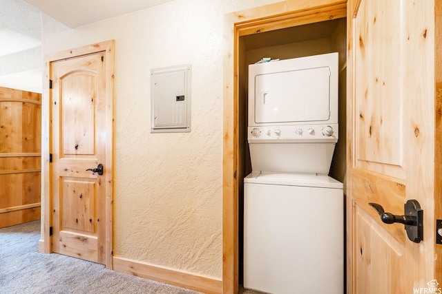 2653 Canyon Resort Dr Unit 227, Park City, UT 84098 - laundry room with stacked washer and dryer, electric panel, and light colored carpet