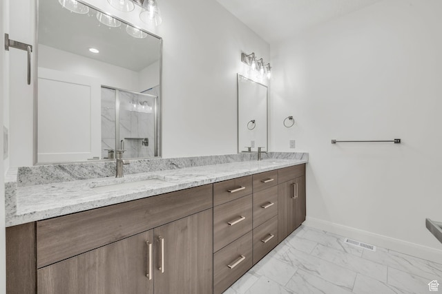 233 E Burch Creek Pl S, Ogden, UT 84405 - full bath featuring baseboards, double vanity, a stall shower, marble finish floor, and a sink