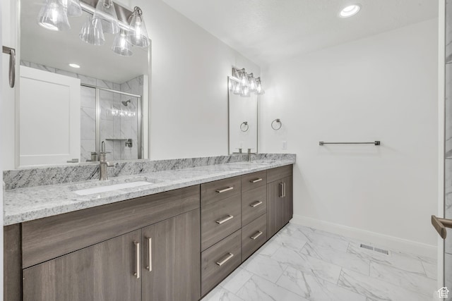 233 E Burch Creek Pl S, Ogden, UT 84405 - full bath featuring visible vents, marble finish floor, a sink, a marble finish shower, and baseboards