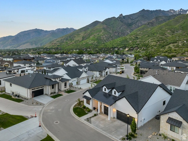 aerial view with a mountain view and a residential view