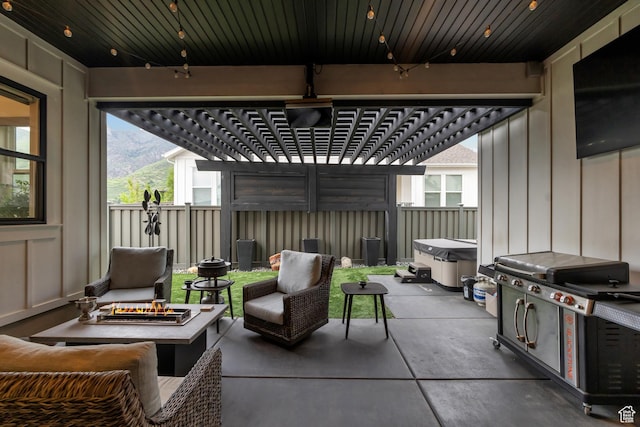 view of patio / terrace featuring a pergola, fence, and an outdoor living space with a fire pit
