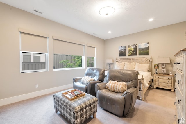 bedroom with visible vents, baseboards, recessed lighting, and light carpet