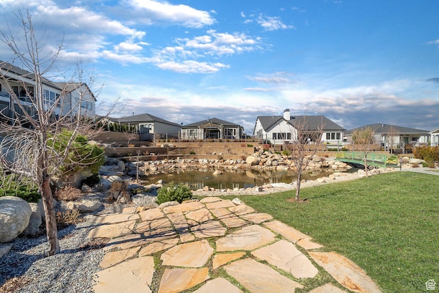 view of yard featuring a residential view