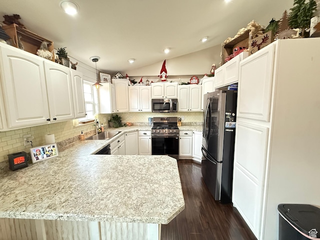 952 W 675 N, Tremonton, UT 84337 - kitchen with sink, white cabinetry, decorative light fixtures, appliances with stainless steel finishes, and kitchen peninsula