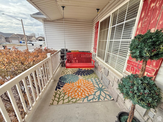 952 W 675 N, Tremonton, UT 84337 - balcony featuring a porch