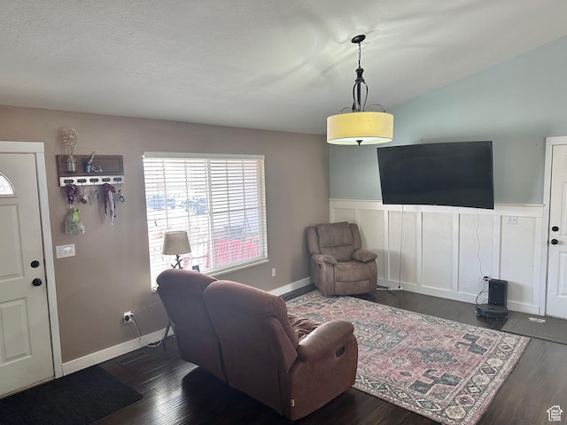 952 W 675 N, Tremonton, UT 84337 - living room featuring dark hardwood / wood-style floors and a textured ceiling