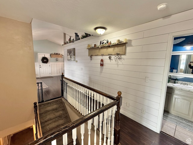 952 W 675 N, Tremonton, UT 84337 - stairway with sink, hardwood / wood-style flooring, and wood walls