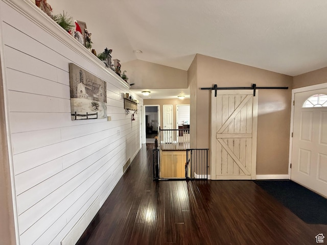 952 W 675 N, Tremonton, UT 84337 - entryway with a barn door, lofted ceiling, and dark hardwood / wood-style floors