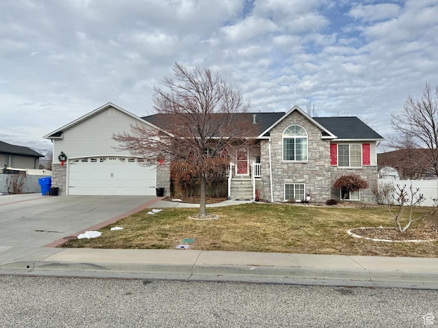 952 W 675 N, Tremonton, UT 84337 - view of front facade with a garage and a front lawn