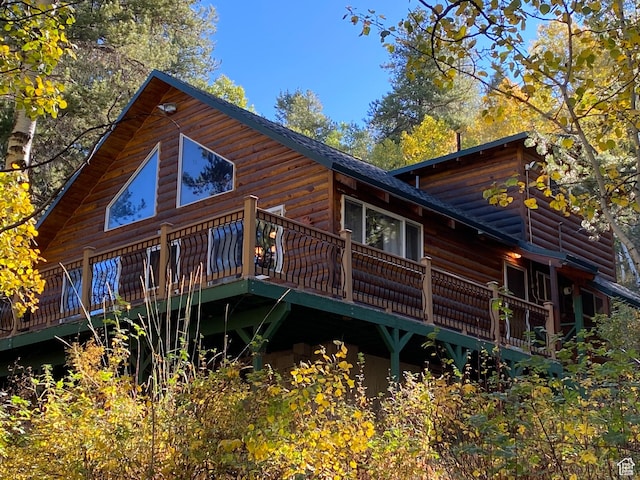 51 Aspen Loop 51&52, Oakley, UT 84055 - rear view of house featuring a deck and log veneer siding