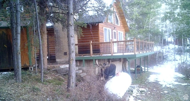 51 Aspen Loop 51&52, Oakley, UT 84055 - rear view of house with a wooden deck and log veneer siding