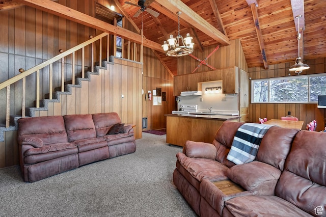 51 Aspen Loop 51&52, Oakley, UT 84055 - carpeted living room featuring a wood ceiling with exposed beams, wood walls, a chandelier, high vaulted ceiling, and ceiling fan