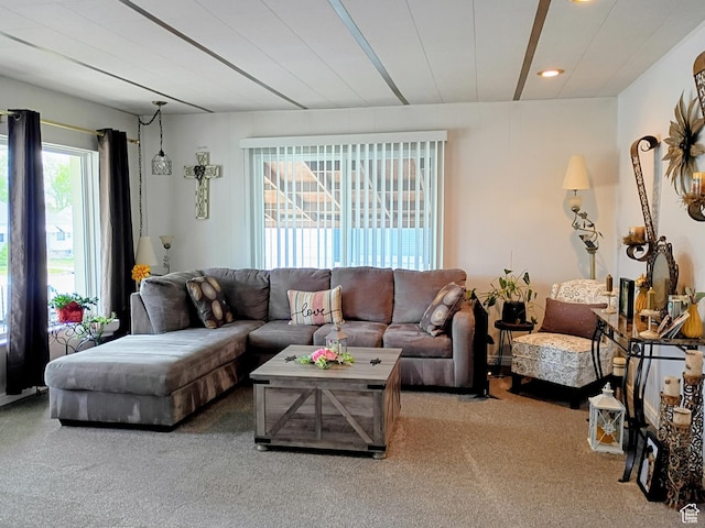 living area with recessed lighting and carpet flooring