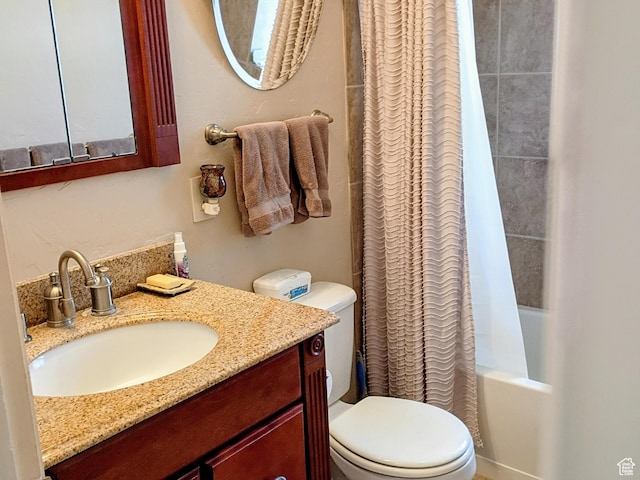 full bathroom with toilet, shower / bath combo with shower curtain, and vanity