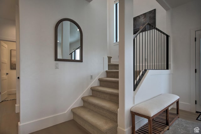 585 N Amber Ln, Garden City, UT 84028 - staircase with hardwood / wood-style floors