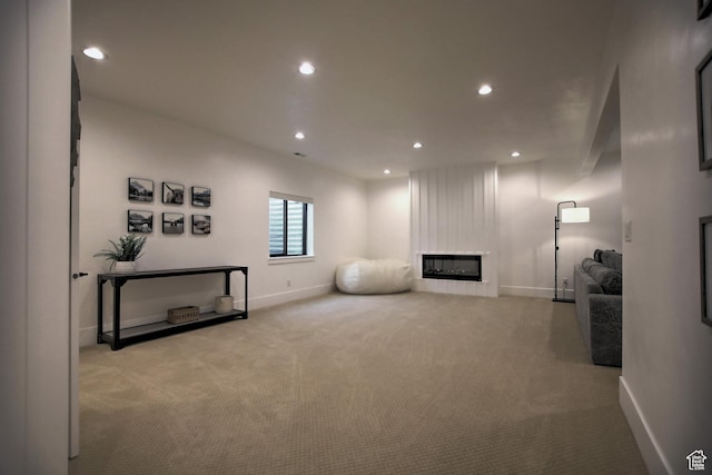 585 N Amber Ln, Garden City, UT 84028 - interior space featuring a large fireplace and light colored carpet