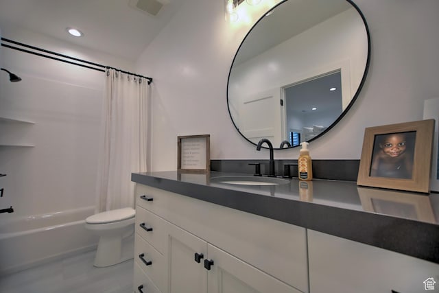 585 N Amber Ln, Garden City, UT 84028 - full bathroom with vanity, toilet, and shower / tub combo