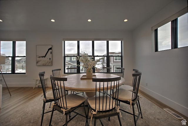 585 N Amber Ln, Garden City, UT 84028 - dining space featuring hardwood / wood-style flooring