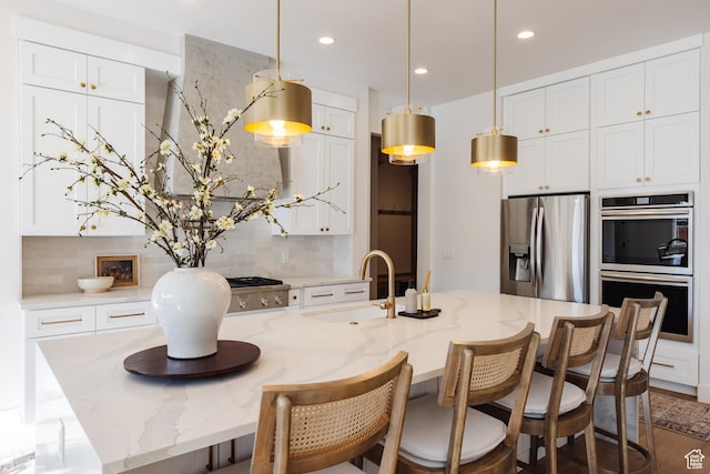 3305 W 2610 S, Hurricane, UT 84737 - kitchen with recessed lighting, a sink, white cabinets, stainless steel appliances, and tasteful backsplash