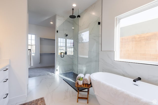 3305 W 2610 S, Hurricane, UT 84737 - full bath featuring a healthy amount of sunlight, a marble finish shower, marble finish floor, and a freestanding tub