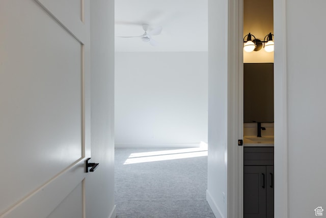 3305 W 2610 S, Hurricane, UT 84737 - hallway with carpet flooring and a sink