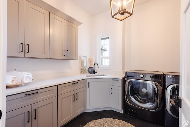 3305 W 2610 S, Hurricane, UT 84737 - laundry room with separate washer and dryer, dark tile patterned flooring, cabinet space, and a sink