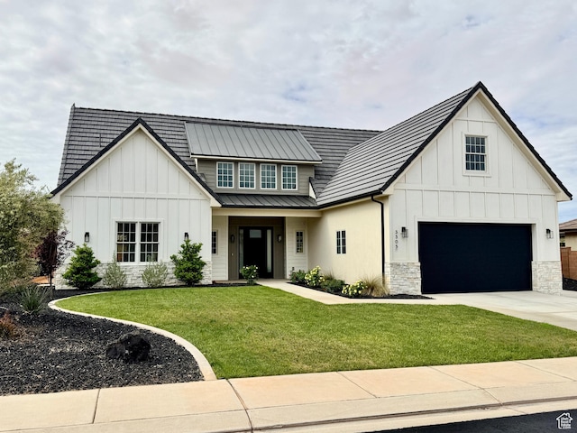 3305 W 2610 S, Hurricane, UT 84737 - modern farmhouse style home featuring a garage, concrete driveway, a front yard, and board and batten siding