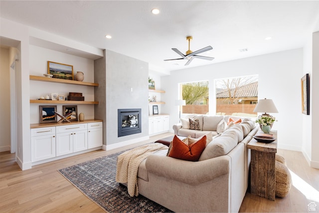 3305 W 2610 S, Hurricane, UT 84737 - living area with recessed lighting, baseboards, ceiling fan, a fireplace, and light wood-type flooring
