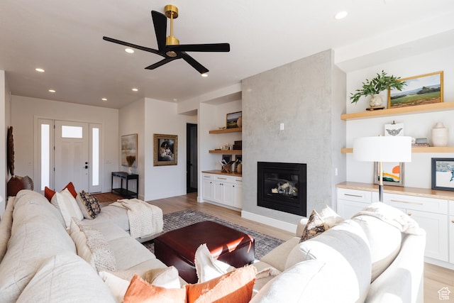 3305 W 2610 S, Hurricane, UT 84737 - living area with recessed lighting, a fireplace, light wood-style flooring, and ceiling fan