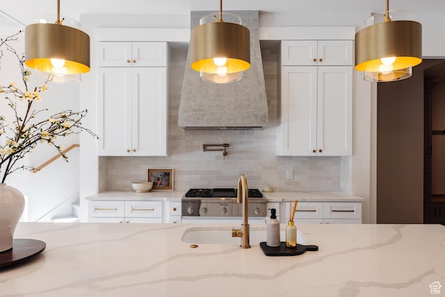 3305 W 2610 S, Hurricane, UT 84737 - kitchen with a sink, tasteful backsplash, and white cabinets