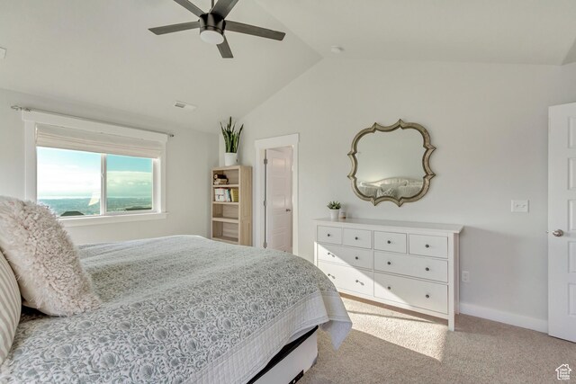 bedroom with ceiling fan, light carpet, baseboards, lofted ceiling, and visible vents