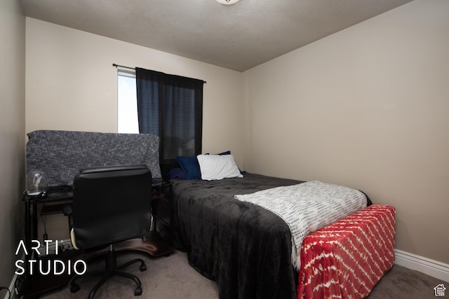 bedroom featuring carpet flooring